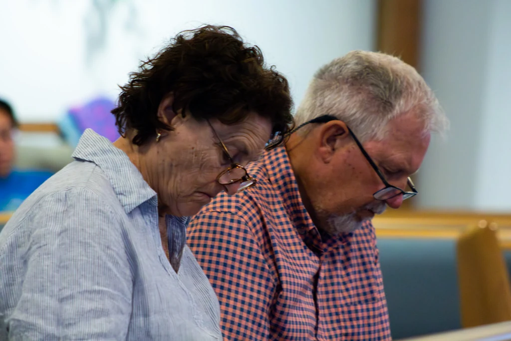 Two members of The Way reading Scripture side by side